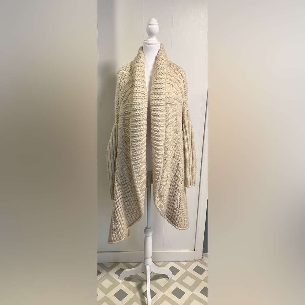 Cozy mid length cardigan cream color smoke free home size L. Clean
